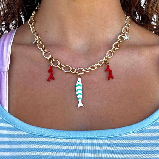 Spiros gold sea charm necklace on Model